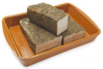 lard in a plate on white background