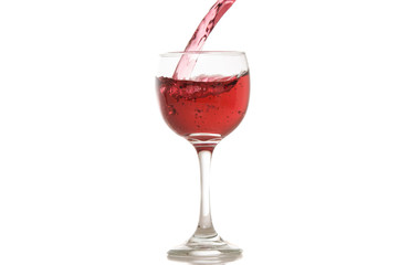 wine and a glass pouring on a white background