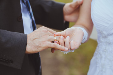 He Put the Wedding Ring on Her