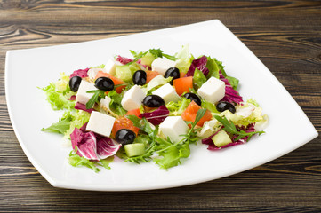 Mixed vegetable salad wit olives and feta cheese