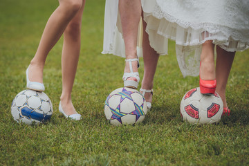 shoes of bride and her bridesmaids on a ball