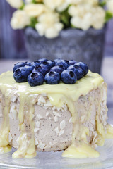 Vanilla cake decorated with blueberries