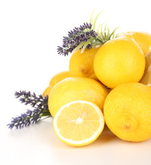 Still life with fresh lemons and lavender, isolated on white