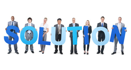 Group of Business People Holding the Word "SOLUTION"