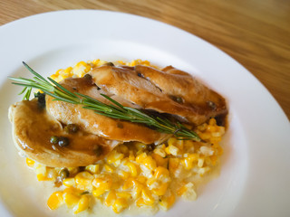 Grilled chicken breasts and vegetables