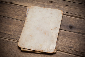 Old paper on the wood background