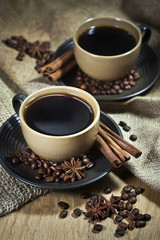 Two cups of coffee with spices
