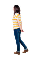 back view of standing young beautiful  brunette woman