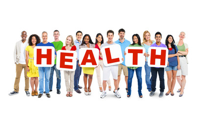 Multiethnic Group Of People Holding the Word "HEALTH"