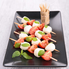 mozzarella cheese with basil and tomato