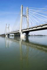 Fototapeta na wymiar Cable-stayed bridge across river Po in Northern Italy