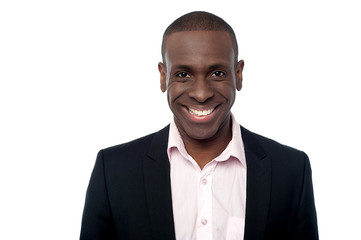 Young smiling relaxed corporate guy