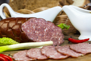 sausage on a wooden plate in a restaurant
