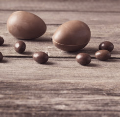 Chocolate Easter Eggs Over Wooden Background
