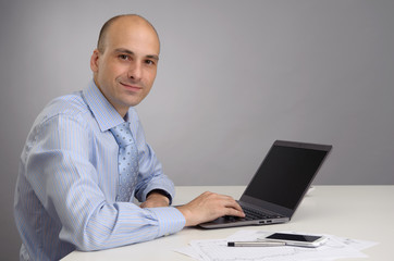 man working on laptop