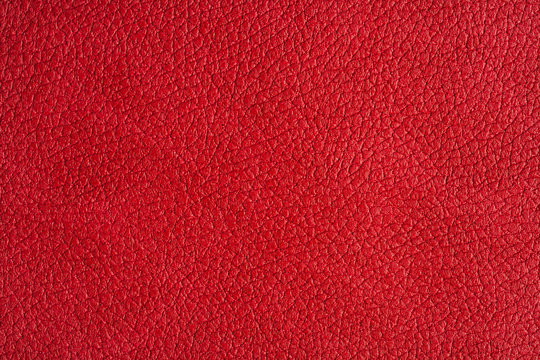 close up view on red leather texture studio shot