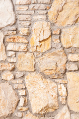 Vertical stone background wall of stonework