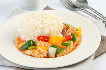 Fried seafood with curry powder on dish