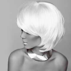 Hairstyle. Fashion blonde woman. White Short Hair. Beautiful gi