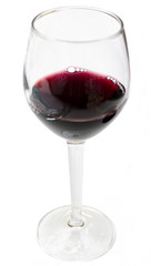Cup of red wine with bubbles