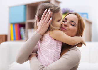 Obraz na płótnie Canvas Portrait of loving mother and daughter