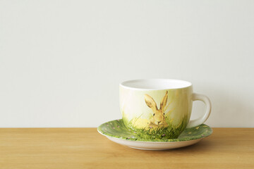 Mug/cup on wood table and white background