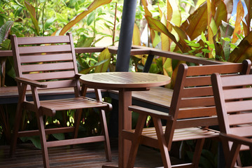 Obraz premium table and chairs wooden in coffee shop