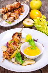 Skewers of chicken fillet with apples