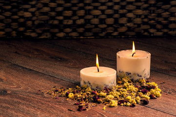 Dry flowers petals and candles