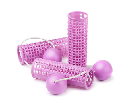 Pink plastic hair curlers
