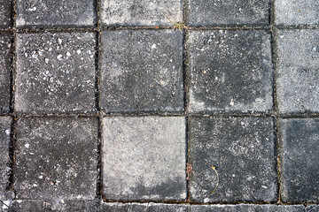 Top view Square brick on pavement
