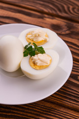 Deviled eggs with parsley in a plate