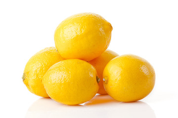 ripe lemons on a white background