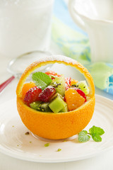 Fruity summer salad in orange.