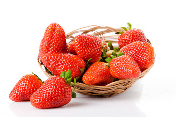 Ripe red strawberries on white background isolated