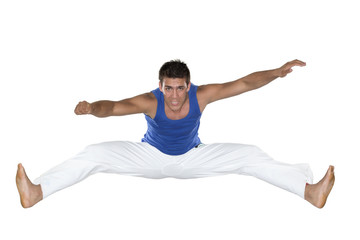 Capoeira, Brazilian Man jumping, white and blue