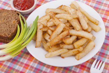 Chips in a bowl on the table.