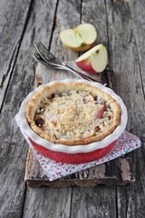 Homemade apple-raisins tart with oatmeal crumble.