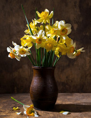 Beautiful daffodils in black vase