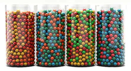 A colourful background of assorted candy in glass