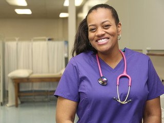 Smiling Nurse African American in Hospital - 63301378