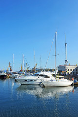 Fototapeta premium White motor yacht over harbor pier, Odessa, Ukraine