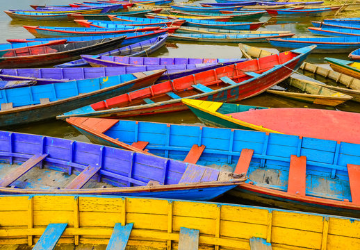 Detail of old colorful sail boats in the lake