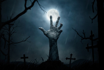 Halloween, dead hand coming out from the soil - obrazy, fototapety, plakaty