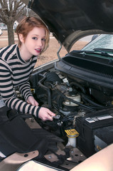 Fototapeta na wymiar Woman auto mechanic
