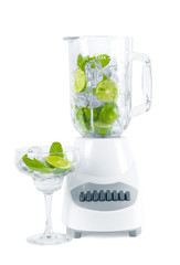 Fresh fruit in blender, lime and mint
