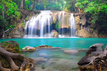 Fototapeta na wymiar Deep forest waterfall at Erawan waterfall National Park