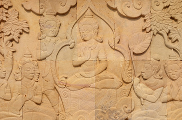 thai style sandstone carving art on the wall  temple