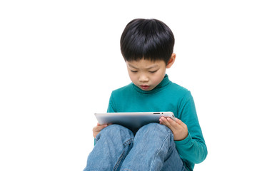 Asian little boy using tablet isolated on white