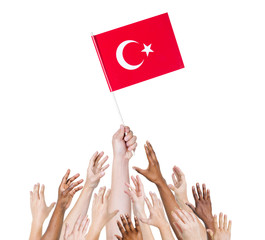 Human Arms Raised for the Flag of Turkey